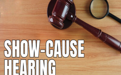 Define the term “show cause hearing”